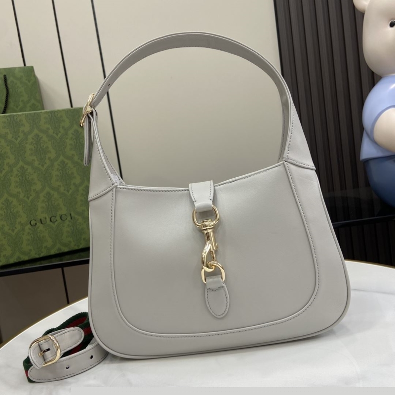 G*u*i top handle bags